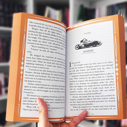 Open book with a page turned, showing text and an illustration of a horse.