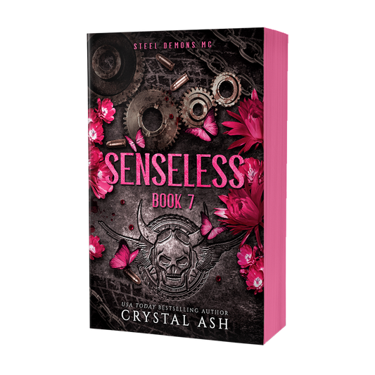 Book cover of 'Senseless Book 7' by Crystal Ash with mechanical elements and pink flowers on a black background.